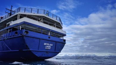 MV Ortelius expedition ship anchored in Robertson Bay near Cape Adare, Antarctica