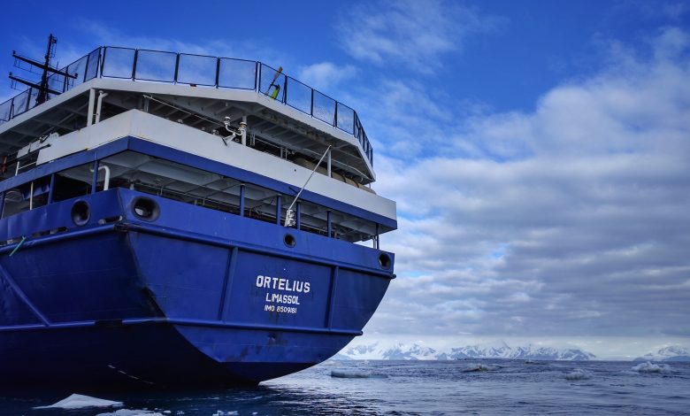MV Ortelius expedition ship anchored in Robertson Bay near Cape Adare, Antarctica